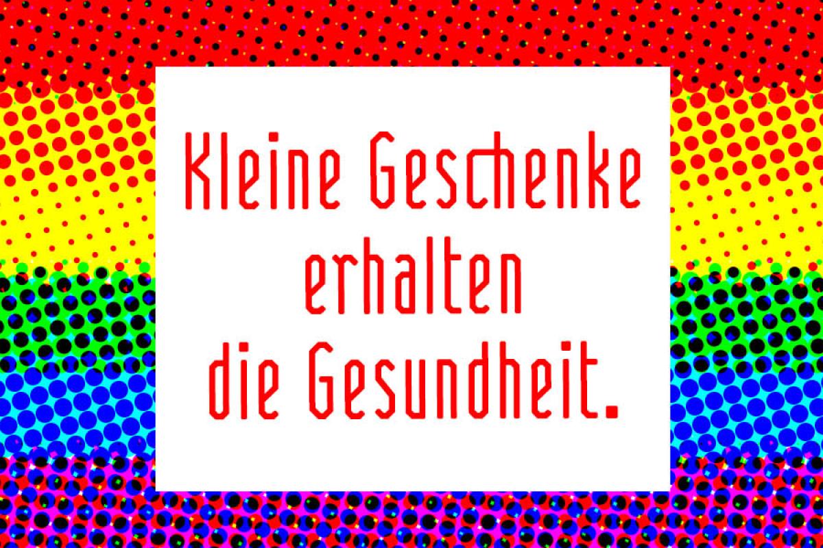 Kleine Geschenke erhalten die Gesundheit als Spruch auf Regenbogen-Farben-Hintergrund